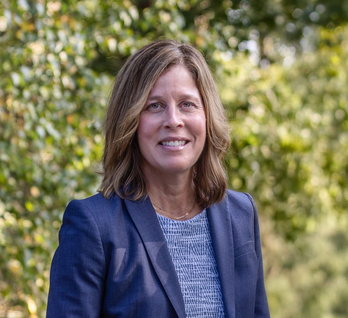 Esther Manheimer smiling outdoors