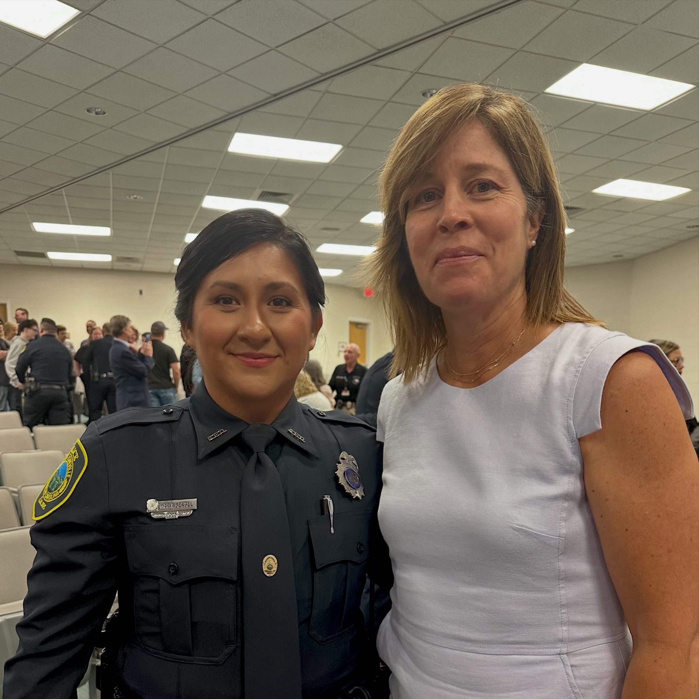 Esther Manheimer with an Asheville police officer