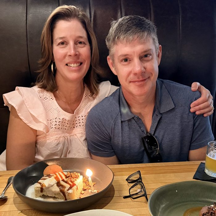Esther and Mark celebrating a birthday at dinner