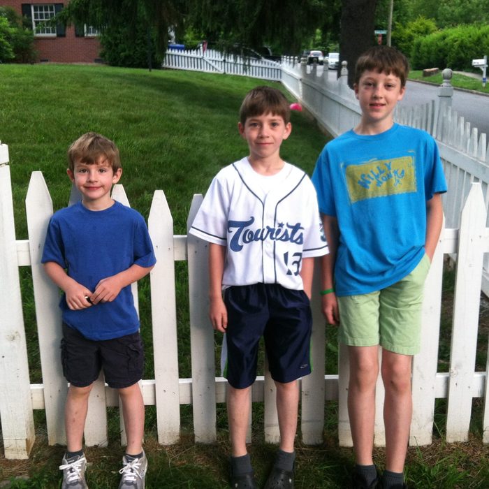 The three Manheimer-Harris boys as kids, one in an Asheville Tourists jersey